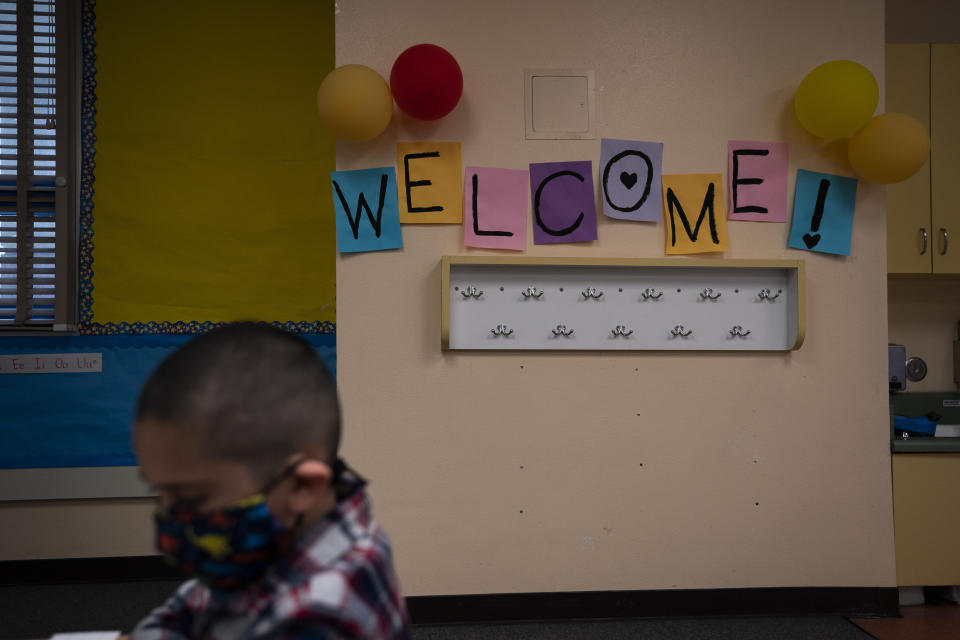 A welcome sign adorns a kindergarten classroom on the first day of in-person learning at Maurice Sendak Elementary School in Los Angeles, Tuesday, April 13, 2021. More than a year after the pandemic forced all of California's schools to close classroom doors, some of the state's largest school districts are slowly beginning to reopen this week for in-person instruction. (AP Photo/Jae C. Hong)