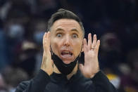 Brooklyn Nets head coach Steve Nash instructs his players in the first half of an NBA basketball game against the Cleveland Cavaliers, Monday, Jan. 17, 2022, in Cleveland. (AP Photo/Tony Dejak)