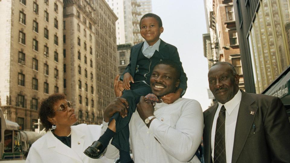 Mandatory Credit: Photo by Dave Pickoff/AP/Shutterstock (7325892a)George and Ann Smith with their son Buffalo Bills 1st choice, Bruce Smith and nephew KevinBruce Smith and Family.