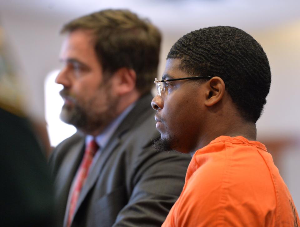Sean Thomas, right, and his attorney, Jonathan Hackworth, listen to Judge Thomas Krug as he sentences Thomas to life in prison for the 2019 killing of 26-year-old Christopher Rashad Ramos. Thomas and co-defendant, Davion Lee, were convicted of murder in the first degree, armed burglary of a dwelling, and robbery with a firearm.