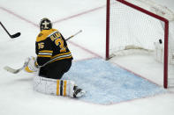 Boston Bruins goaltender Linus Ullmark looks back as the puck hits the back of the net on a goal by Nashville Predators center Cody Glass during the second period of an NHL hockey game Tuesday, March 28, 2023, in Boston. (AP Photo/Charles Krupa)