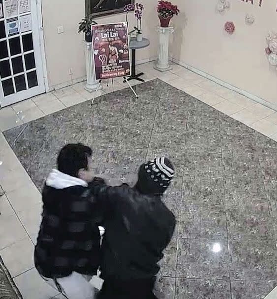 PHOTO: Brandon Tsay is seen in surveillance video wrestling a gun away from Huu Can Tran, 72, who is alleged to have killed 10 people in nearby Monterey Park, in a dance hall in Alhambra, California, on Jan. 21, 2023. (Lai Lai Ballroom)