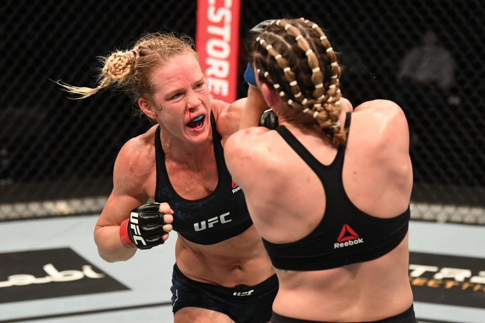 ABU DHABI, UNITED ARAB EMIRATES - OCTOBER 04:  (LR) Holly Holm punches Irene Aldana of Mexico in their women's bantamweight bout during the UFC Fight Night event inside Flash Forum on UFC Fight Island on October 04, 2020 in Abu Dhabi, United Arab Emirates.  (Photo by Josh Hedges / Zuffa LLC)