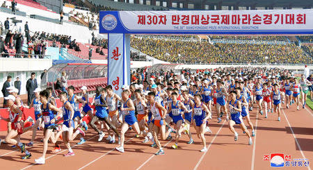 Participants take part in the 30th Mangyongdae Prize International Marathon in Pyongyang, North Korea, in this photo released on April 7, 2019 by North Korea's Korean Central News Agency (KCNA). KCNA via REUTERS