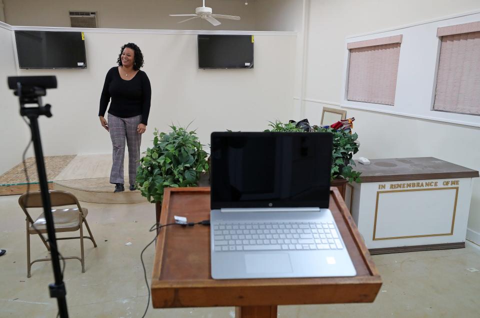 Pastor Shiloh Hooks-Johnson of Kingdom Restoration Church discusses Wednesday how the Akron congregation began nearly a year ago as an online Bible study. Now it has its own church on Burton Avenue in the Highland Square neighborhood.