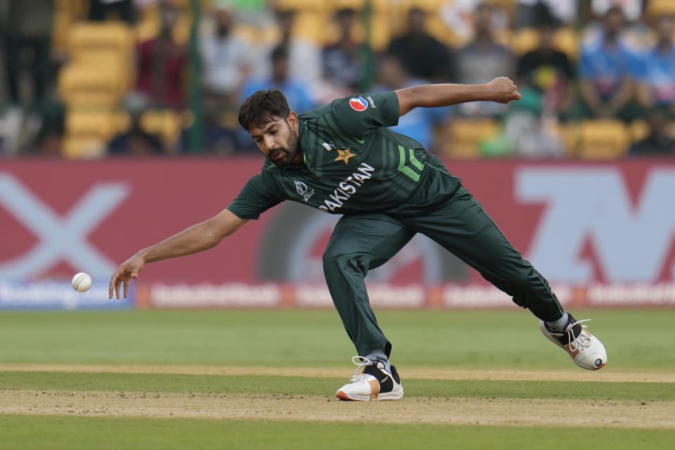 Pakistan's Haris Rauf fields a ball during the ICC Men's Cricket World Cup match between New Zealand and Pakistan in Bengaluru, India, Saturday, Nov. 4, 2023. (AP Photo/Aijaz Rahi)