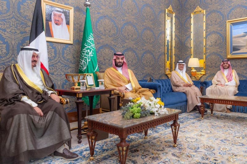 Crown Prince of Saudi Arabia Mohammed bin Salman al-Saud (2nd L) and Kuwaiti Prime Minister Sheikh Ahmad Abdullah Al-Ahmad Al-Sabah (L) hold a joint meeting on the sidelines of the 33rd Arab League Summit. -/Saudi Press Agency/dpa