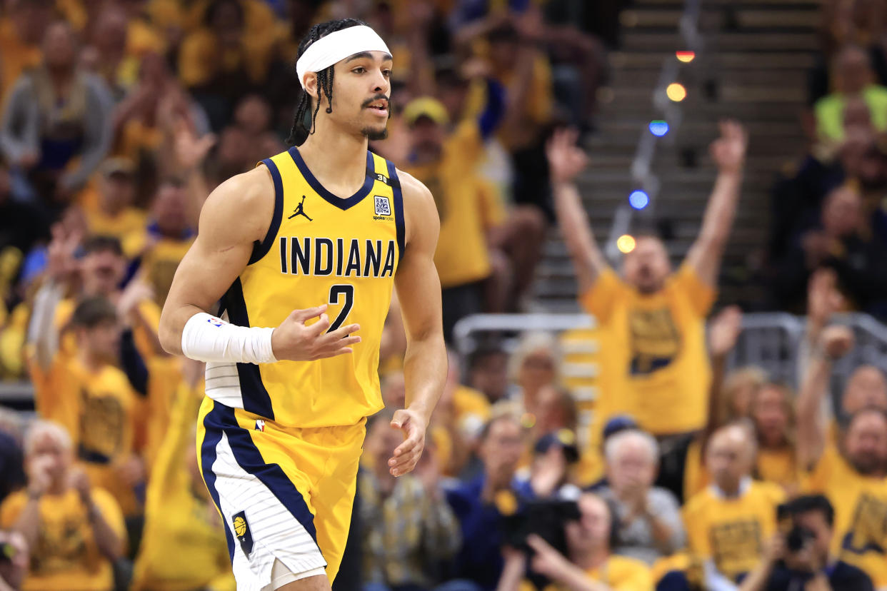 INDIANAPOLIS, INDIANA - MAY 27: Andrew Nembhard #2 of the Indiana Pacers reacts after a three point shot during the second quarter in Game Four of the Eastern Conference Finals at Gainbridge Fieldhouse on May 27, 2024 in Indianapolis, Indiana. NOTE TO USER: User expressly acknowledges and agrees that, by downloading and or using this photograph, User is consenting to the terms and conditions of the Getty Images License Agreement. (Photo by Justin Casterline/Getty Images)