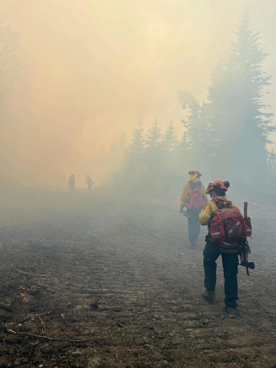 Firefighters patrol the Kimiwan Complex Fire SWF068 north of High Prairie, Alberta, Canada in an undated photograph. / Credit: ALBERTA WILDFIRE via Reuters