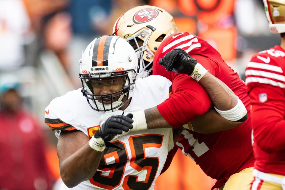Cleveland Browns defensive end Myles Garrett (95) is blocked by San Francisco 49ers offensive tackle Trent Williams (71) during the third quarter Sunday in Cleveland.