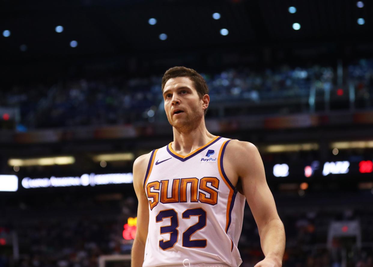 Jimmer Fredette with the Phoenix Suns guard in 2019 during a game against the Utah Jazz at Talking Stick Resort Arena.