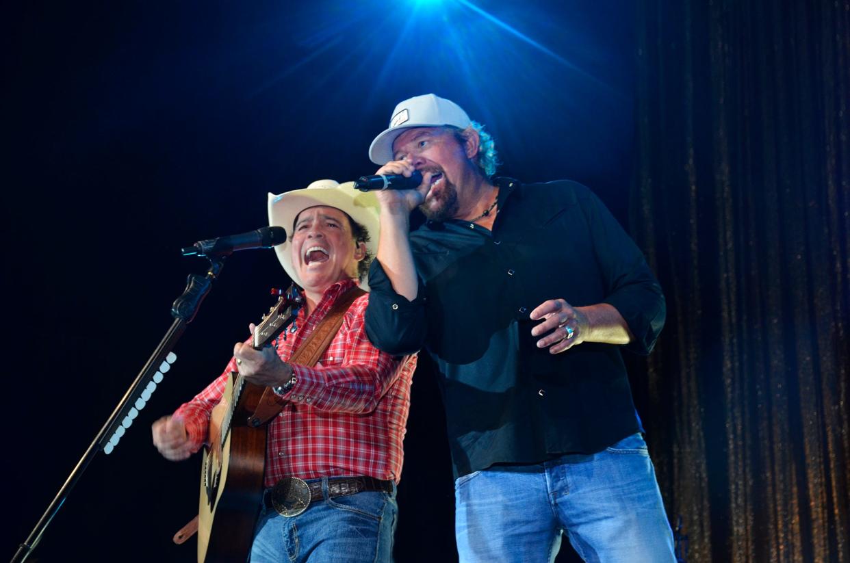Clay Walker and Toby Keith perform at The Criterion in downtown Oklahoma City June 11 at the pre-tournament gala for the Toby Keith & Friends Golf Classic. The two-day fundraiser garnered $1.4 million for the Toby Keith Foundation's OK Kids Korral.