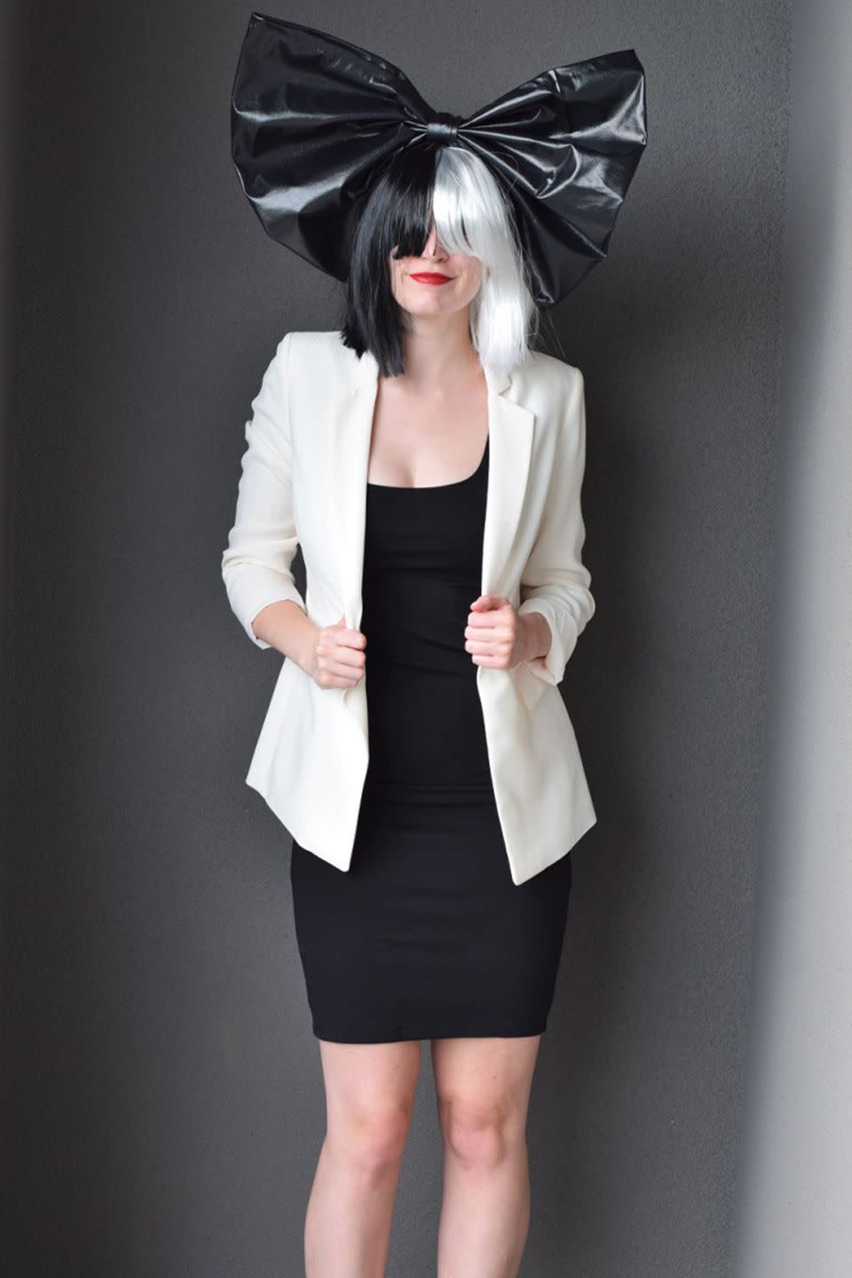 <p>Here's a cheap thrill: The only thing you need to buy for this Sia costume is her signature two-toned wig. If you have a +1, convince them to dress up as Maddie Ziegler, so you can be a well-rounded pair. </p><p><em><a href="https://bunnybaubles.com/2016/10/24/diy-sia-costume/" rel="nofollow noopener" target="_blank" data-ylk="slk:Get the tutorial at Bunny Baubles »;elm:context_link;itc:0;sec:content-canvas" class="link ">Get the tutorial at Bunny Baubles »</a></em></p>