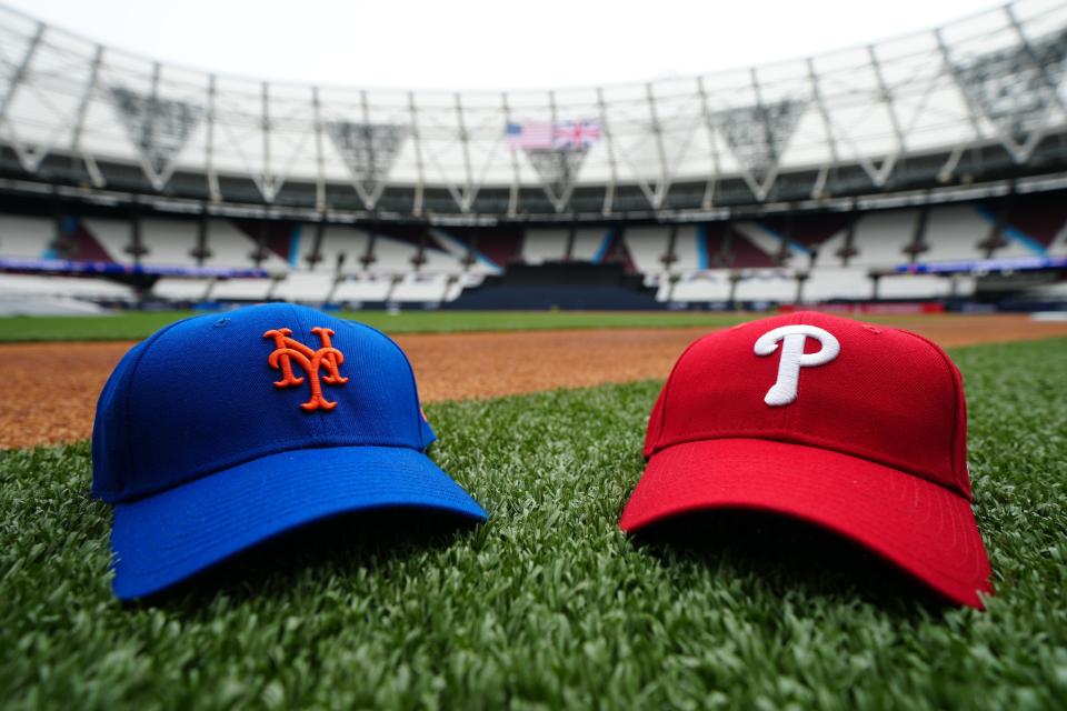 A detail view of a Philadelphia Phillies and New York Mets hat prior to the 2023 London Series Workout Day at London Stadium on Friday, June 23, 2023, in London.