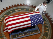 <p>Jack McCain, son of, Sen. John McCain, R-Ariz. touches the casket during a memorial service at the Arizona Capitol on Wednesday, Aug. 29, 2018, in Phoenix. (Photo: Ross D. Franklin, Pool/AP) </p>