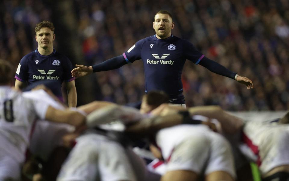 Rugby Union - Six Nations Championship - Scotland v England - BT Murrayfield Stadium, Edinburgh, Scotland, Britain - February 5, 2022 Scotland's Finn Russell reacts during a scrum - Action Images via Reuters/Lee Smith