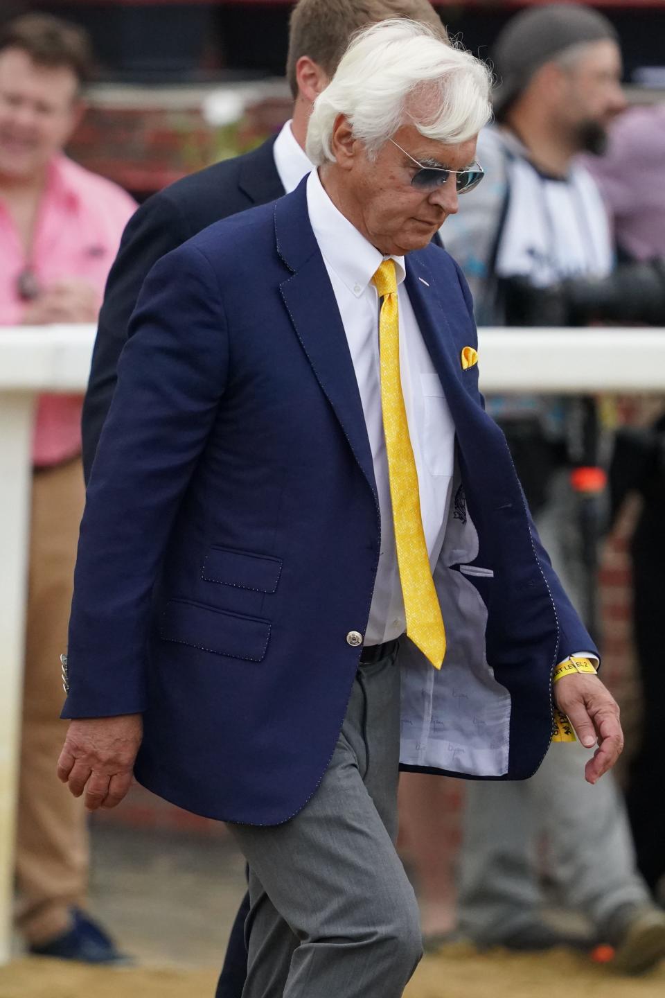 National Treasure trainer Bob Baffert walks across the track prior to the 148th running of the Preakness Stakes at Pimlico Race Course.