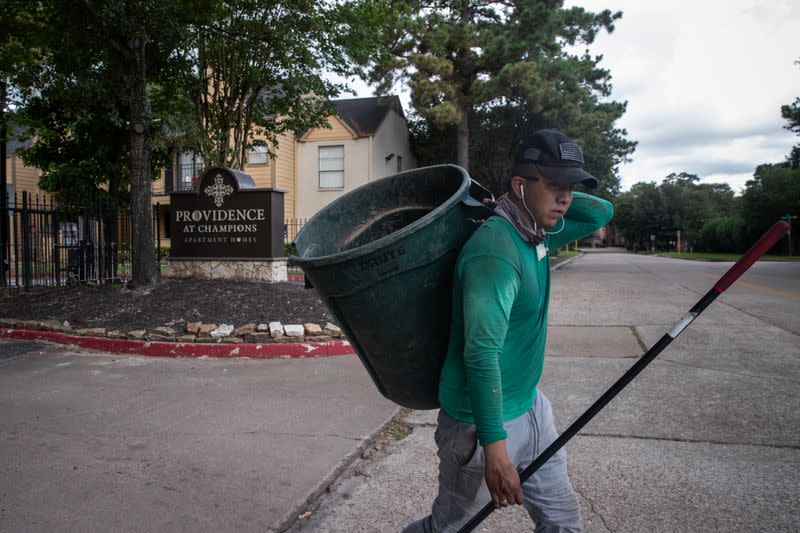 A man walks near the Providence at Champions apartment complex in Houston, Texas