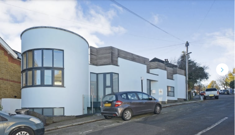 This lovely house in Brighton has four bedrooms and a striking double height curved family room