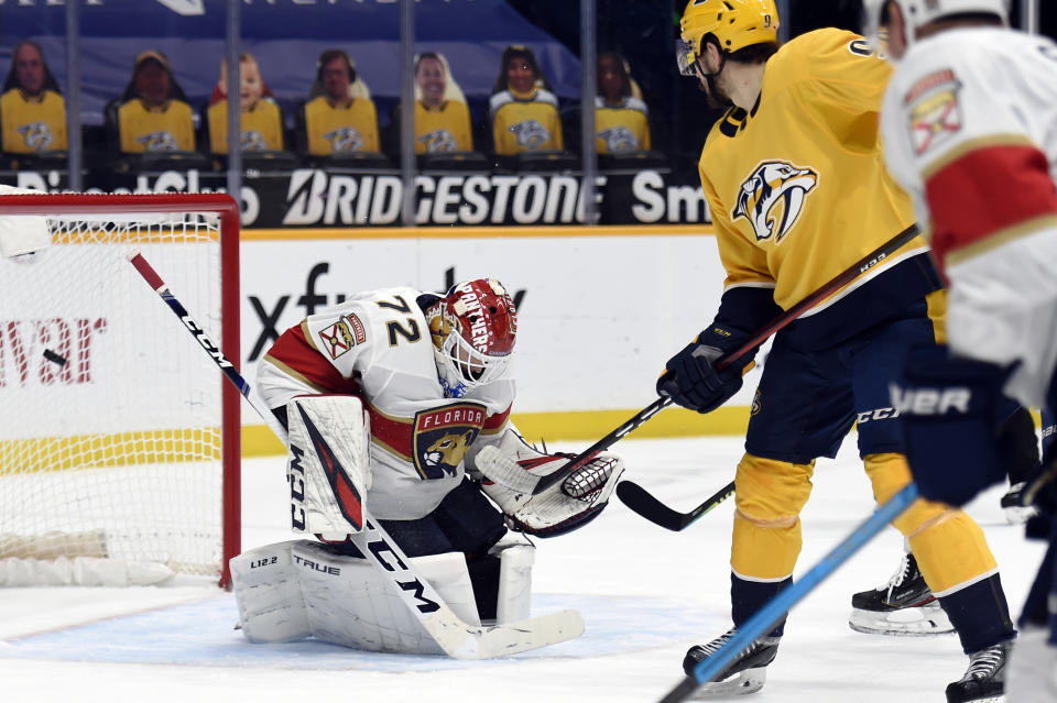 Nashville Predators left wing Filip Forsberg (9) deflects a shot past Florida Panthers goaltender Sergei Bobrovsky (72) for a goal during the second period of an NHL hockey game Thursday, March 4, 2021, in Nashville, Tenn. (AP Photo/Mark Zaleski)