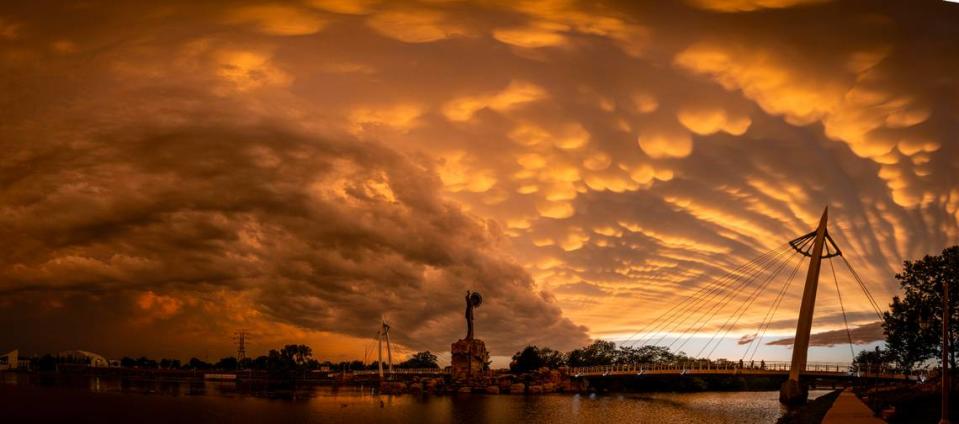 Mammatus clouds cover the Wichita sky at the Keeper of the Plains on Tuesday night after a line of thunderstorms passed through the area.