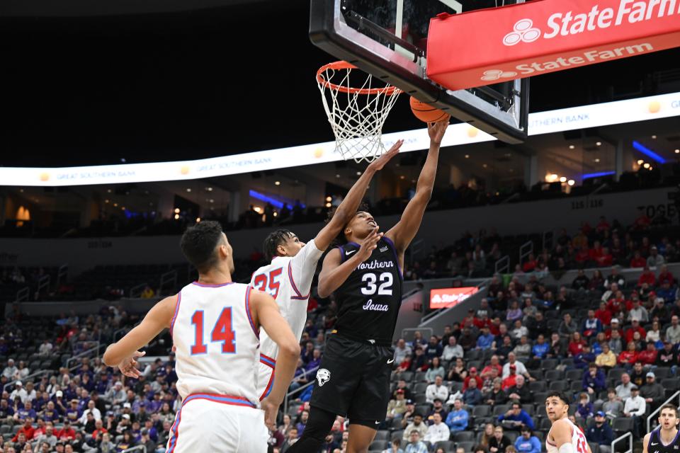 Tytan Anderson (32) goes up for a shot during UNI basketball's game against Bradley on Friday.