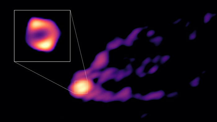  The black hole M87* pictured with a gigantic jet of material streaming from it. 