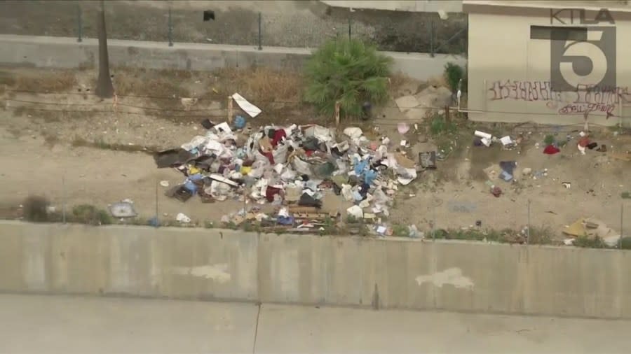 A homeless encampment near the Chatsworth Metrolink station, shown on June 1, 2023, has riled residents. (KTLA)