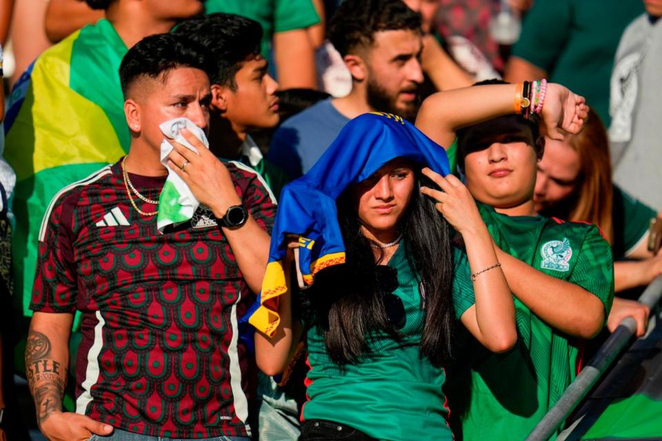 PHOTO: Spectators stand in the heat while waiting to watch players warm up prior to an international soccer friendly between Mexico and Brazil on June 8, 2024, at Texas A&M's Kyle Field in College Station, Texas. (Julio Cortez/AP)