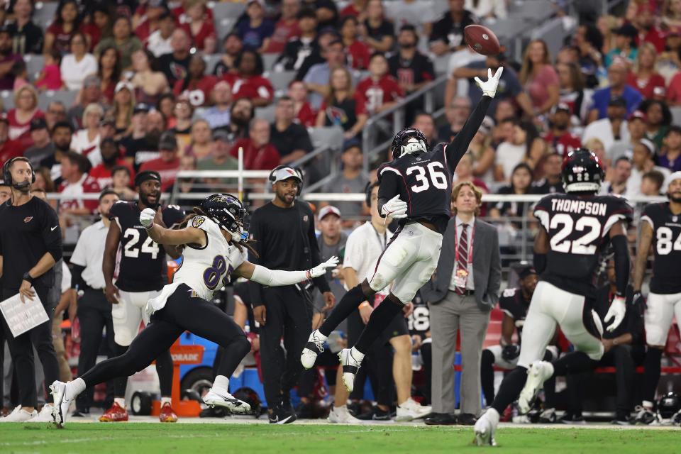 Cornerback Josh Jackson #36 of the Arizona Cardinals reaches for an incomplete pass intended for wide receiver Shemar Bridges #85 of the Baltimore Ravens during the first half of the NFL preseason game at State Farm Stadium on August 21, 2022, in Glendale, Arizona.