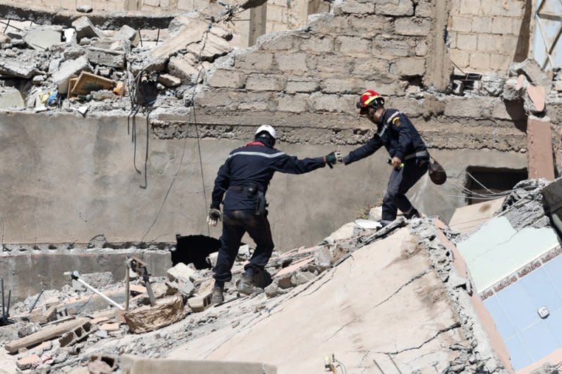 Moroccan rescue teams work Monday amid the rubble of a house destroyed in Friday's earthquake. Photo by Mohamed Messara/EPA-EFE