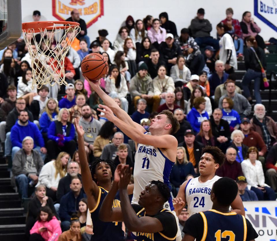Horseheads' Alex Daugherty goes up for a shot in a 54-50 loss to Mount St. Michael Academy in a Boys National Division quarterfinal at the Josh Palmer Fund Clarion Classic on Dec. 28, 2023 at Elmira High School.