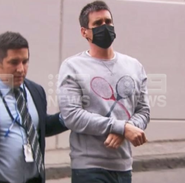 41-year-old Richard Pusey being led away by police