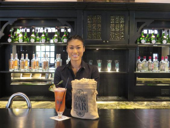 Sink a Singapore Sling at Long Bar with head bartender Priscilla Leong (Tamara Hinson)