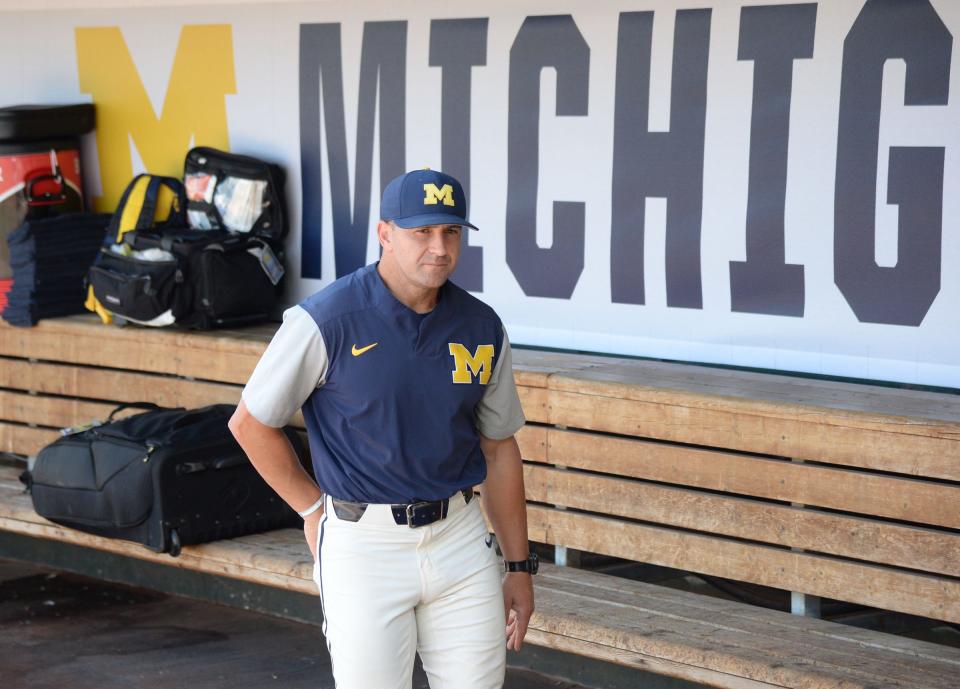 Michigan coach Erik Bakich in the dugout before Game 1 of the championship series of the 2019 College World Series against the Vanderbilt Commodores, June 24, 2019 at TD Ameritrade Park in Omaha, Neb.