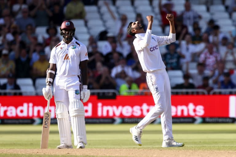 Moment of victory: England's Shoaib Bashir (R) celebrates dismissing West Indies No 11 Shamar Joseph (not pictured) to seal a 241-run win in the second Test at Trent Bridge (Darren Staples)