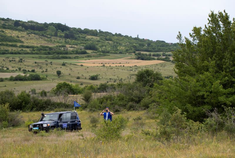 The Wider Image: Bordering Georgia's breakaway regions, villagers fear Russia's next steps