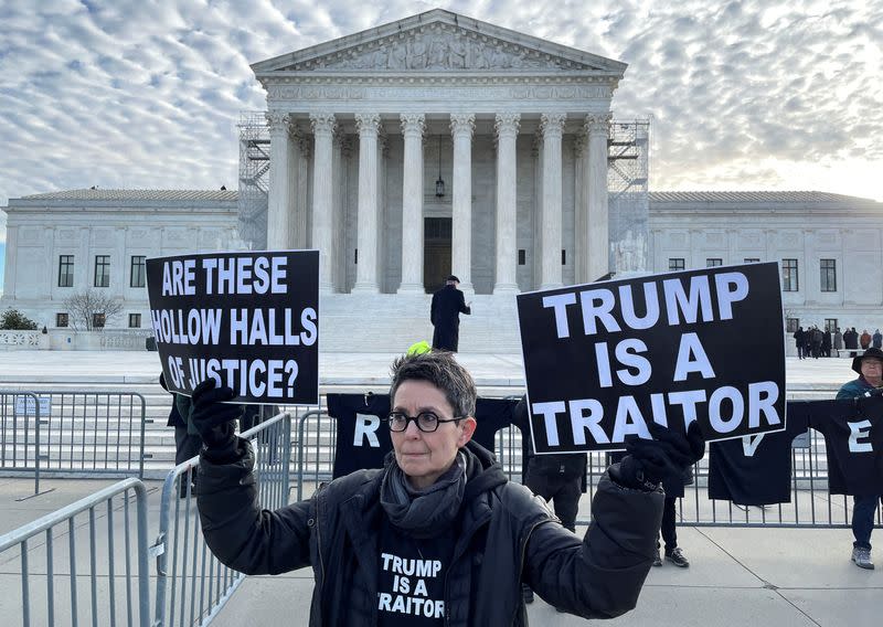 Demonstrators gather outside U.S. Supreme Court ahead of arguments in Trump appeal of Colorado ballot disqualification, in Washington