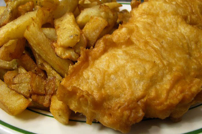 <p>This spacious downtown <strong><a href="http://www.thedailymeal.com/ye-olde-english-fish-chip" rel="nofollow noopener" target="_blank" data-ylk="slk:Woonsocket institution;elm:context_link;itc:0;sec:content-canvas" class="link ">Woonsocket institution</a></strong> has been going strong since 1922, when Yorkshire natives Harry and Ethel Sowden opened this waterfront eatery, and today it's still in the family, with the fifth generation in training. The unique English-style batter recipe, which results in a slightly heavier crust around the fresh-caught pollock or cod, hasn't changed since the day they opened, and the fries are hand-cut and pair perfectly with a shake of malt vinegar. </p>