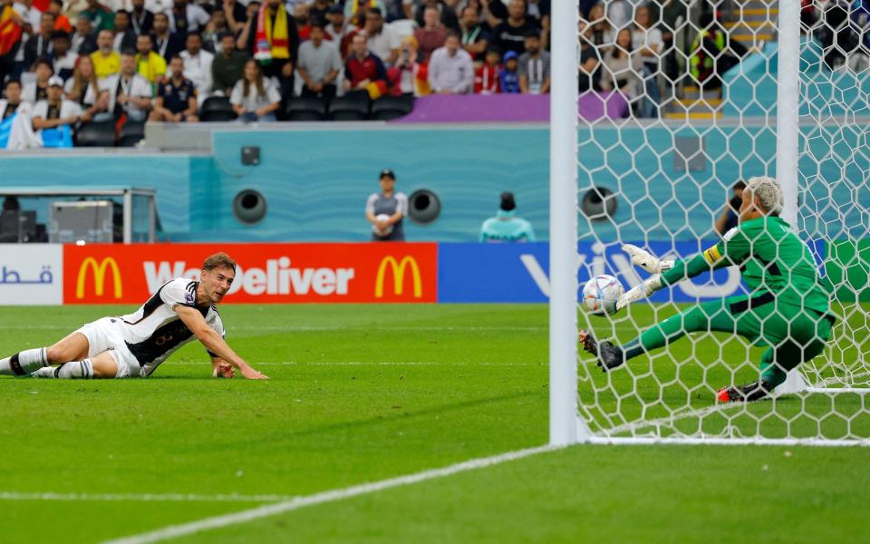 Germany's midfielder #08 Leon Goretzka (L) heads but fails to score during the Qatar 2022 World Cup Group E football match between Costa Rica and Germany at the Al-Bayt Stadium in Al Khor - Odd Andersen/Getty Images