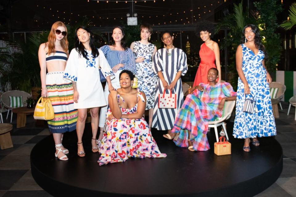 Models wear styles from Kate Spade’s Spring 2022 collection. - Credit: Jason Crowley/BFA.com