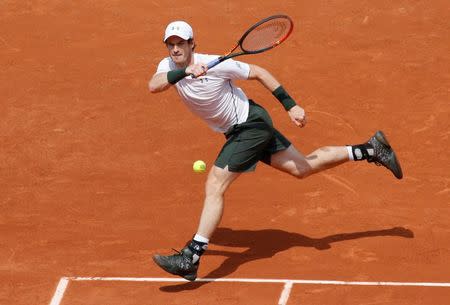 Tennis - French Open - Roland Garros - Ivo Karlovic of Croatia v Andy Murray of Britain - Paris, France - 27/05/16. Murray returns a shot. REUTERS/Jacky Naegelen