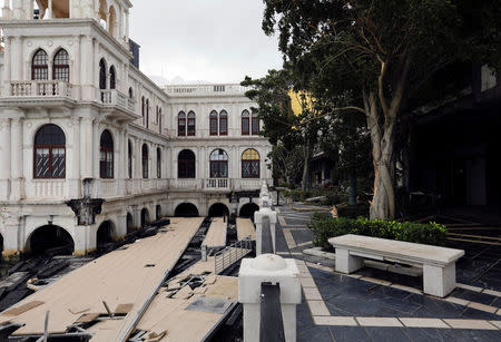 Damaged wall and pier by typhoon Hato are seen at Macau Fisherman's Wharf Hoyle in Macau, China August 24, 2017. REUTERS/Tyrone Siu