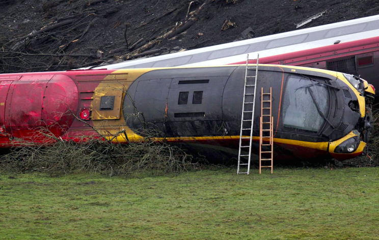 The front of the train plunged down an embankment (Picture: Rex)