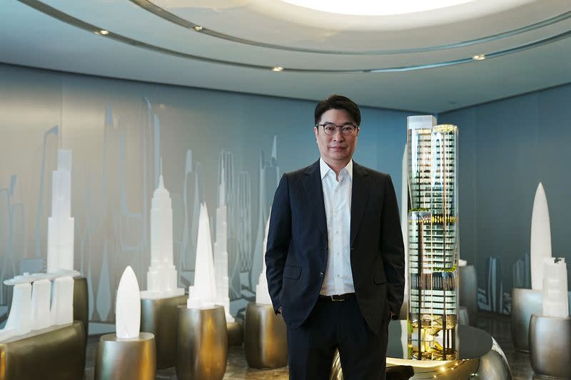 Martin Lee, co-chairman of Henderson Land Development, poses at his office in Hong Kong