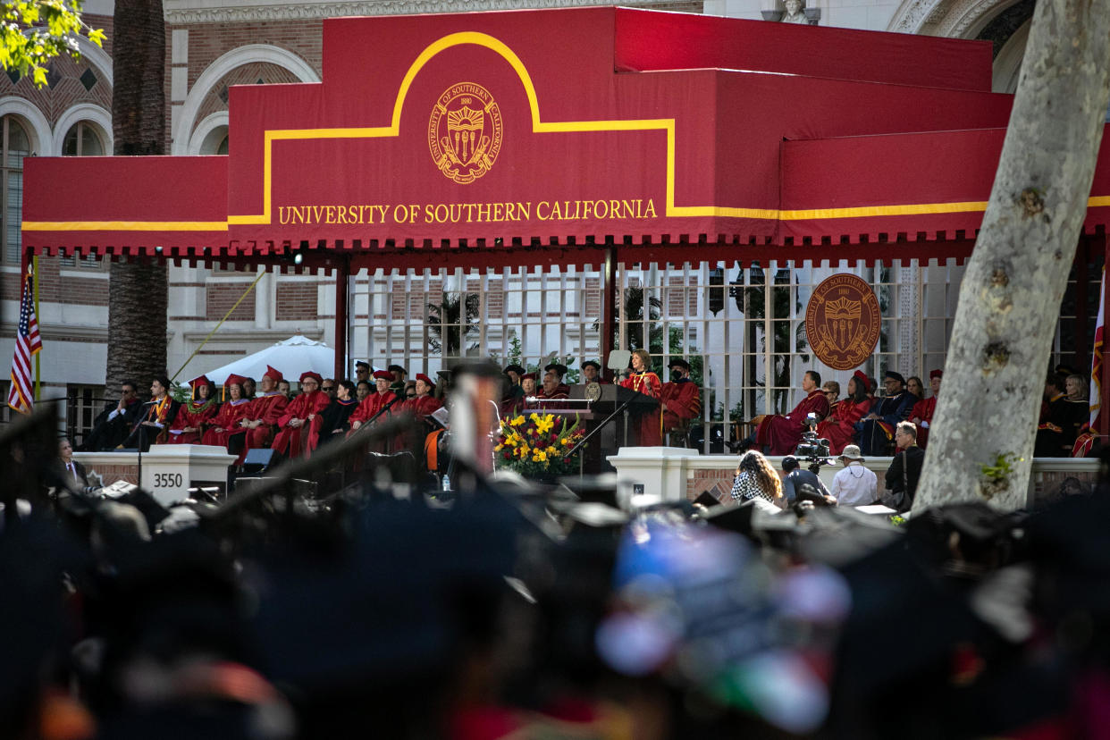Dr. Carol L. Folt, president of the University of Southern California, addresses graduates attending the 2022 graduates at The University of Southern California commencement ceremony on Friday, May 13, 2022, in Los Angeles, CA.  / Credit: Jason Armond