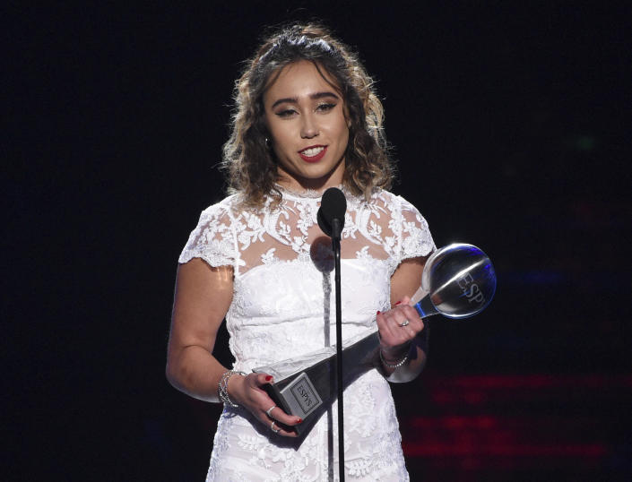 Gymnast Katelyn Ohashi accepts the award for best play at the ESPY Awards on Wednesday, July 10, 2019, at the Microsoft Theater in Los Angeles. (Photo by Chris Pizzello/Invision/AP)