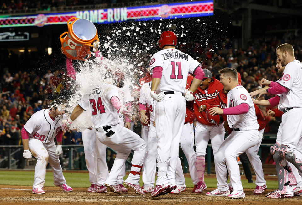 <p>Washington Nationals’ Bryce Harper (34) is doused as he scores on his game-winning two-run homer during the ninth inning of a baseball game against the Philadelphia Phillies at Nationals Park on May 13, 2017, in Washington. The Nationals won 6-4. (Photo: Alex Brandon/AP) </p>