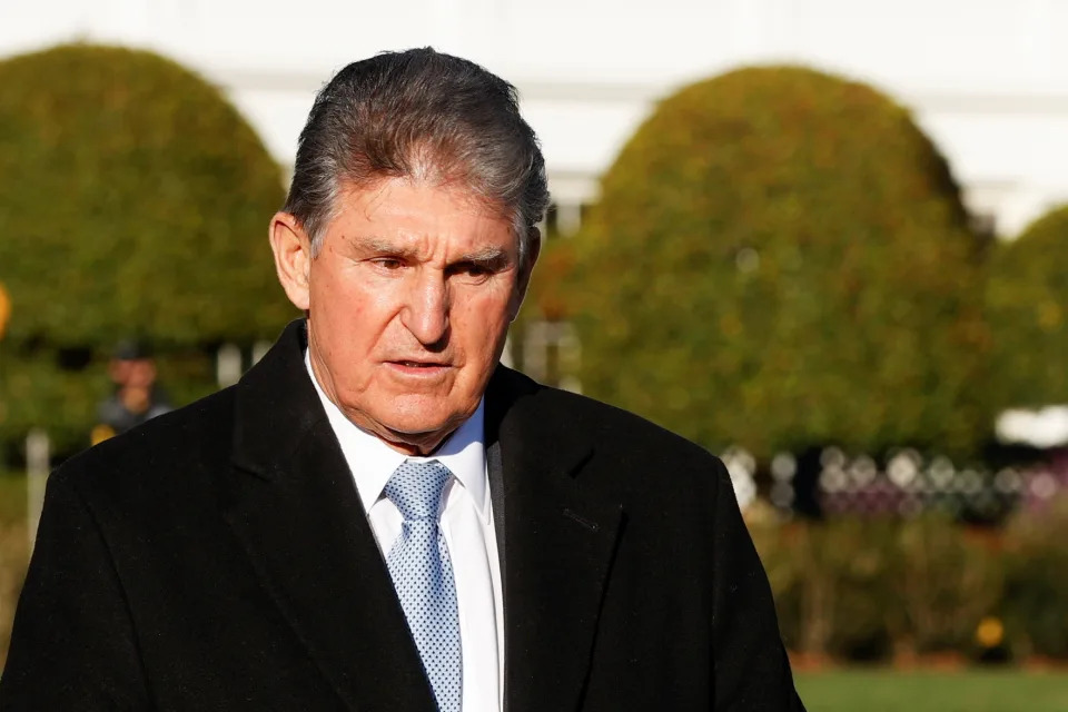 Senator Joe Manchin arrives ahead of a ceremony where U.S. President Joe Biden will sign the 