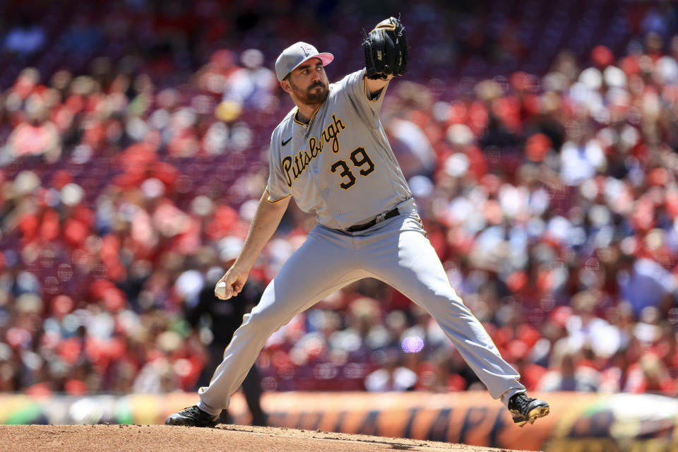 Pittsburgh Pirates' Zach Thompson throws during the first inning of a baseball game against the Cincinnati Reds in Cincinnati, Sunday, May 8, 2022. (AP Photo/Aaron Doster)